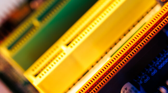 Close up computer memory slot background with yellow and green connector modules for technology banner and motherboard design