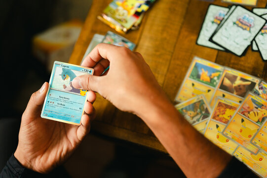 Chicago, IL/USA - September 19, 2026: Person sorting Pok&eacute;mon cards from the 30th Celebration set