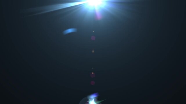 optical light ray loop animation on black screen. Sun rays view, sun spotlight glowing burst concept. optical light beams on black background.