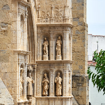 Right side of entrance portal of Santa Mar&iacute;a la Mayor church with saint statues, Morella, Spain