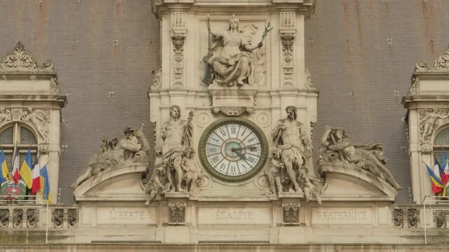 Ornate Clock and Sculptures on the Historic H&ocirc;tel de Ville Facade in Paris, France