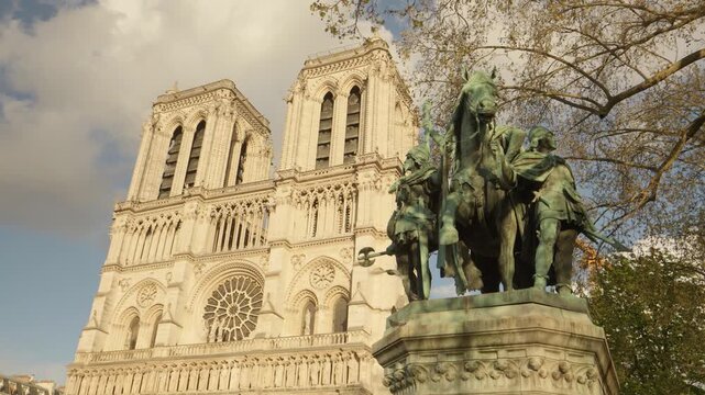 Notre Dame Cathedral and Charlemagne Statue in Paris, France
