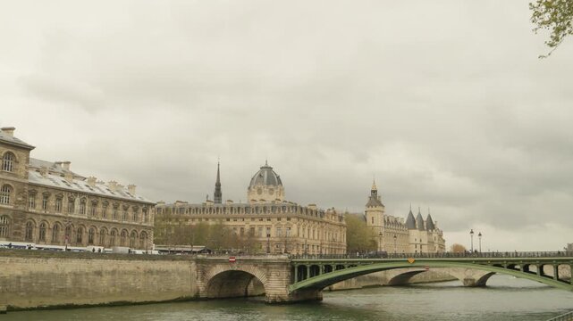 Seine River and Historic Bridge with Classic Paris Architecture in France
