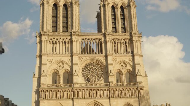 Historic Facade and Twin Towers of Notre-Dame Cathedral in Paris, France