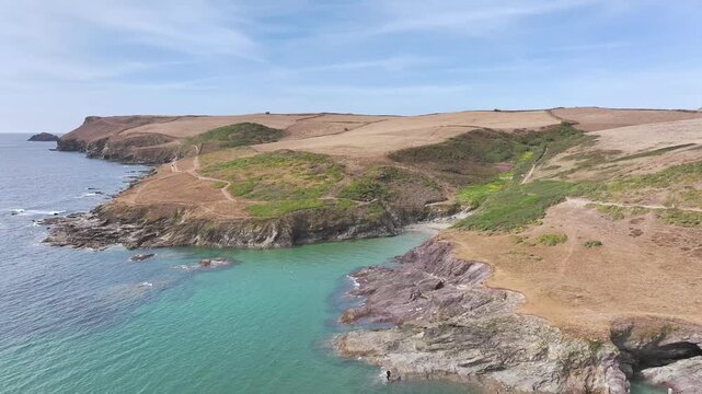 Polzeath Beach over Padstow Bay from a drone, Polzeath, Cornwall, England, Summer 2026