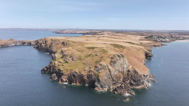 Seven Souls Rock and Pentire Point and Bay over Padstow Bay from a drone, Polzeath, Cornwall, England, Summer 2026