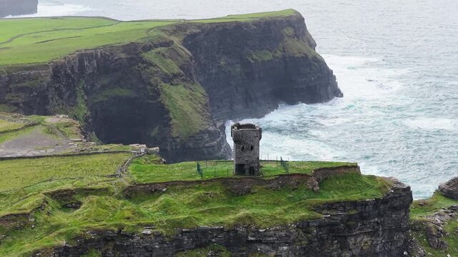 Drone approach to Moher Tower at Hag's Head, County Clare, Ireland