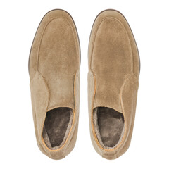 Pair of tan suede slip-on slippers © Anastasiia