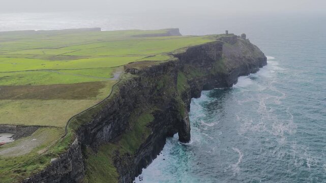 Aerial view toward Hag's Head above Atlantic surf, County Clare, Ireland