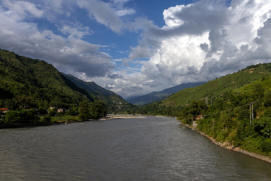 Tama Koshi River Flowing Through Lush Green Himalayan Valley Ramechhap Nepal