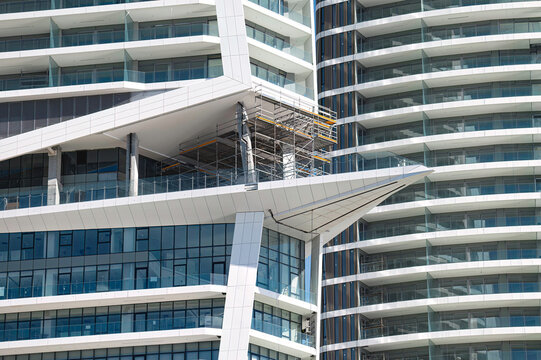 Skyscraper under construction featuring scaffolding in Limassol, Cyprus