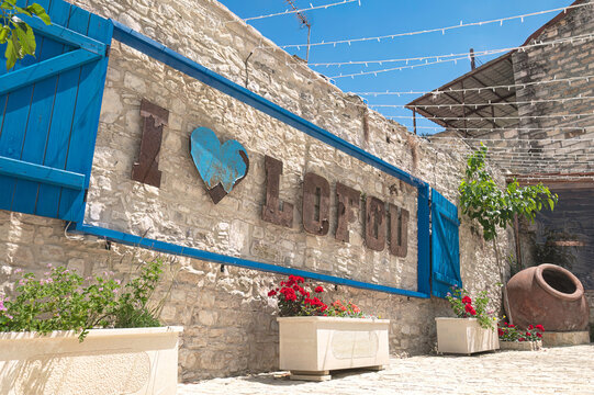 Large I Love Lofou sign on a stone wall in Lofou village. Limassol District, Cyprus