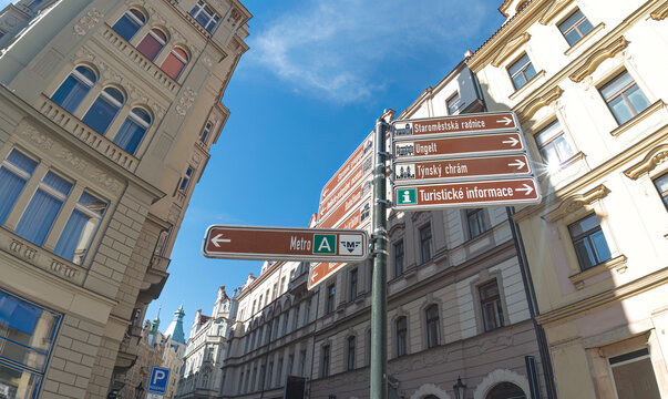 Tourist signs providing directions to popular attractions in Prague, Czech Republic