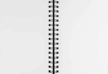 Close up of open spiral notebook blank white paper page with copy space © Minakryn Ruslan 