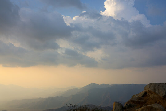 Saudi Arabia Tourism - Dramatic sunbeams breaking through clouds over Al Hada mountain in Al Taif, - Saudi National Day and travel 