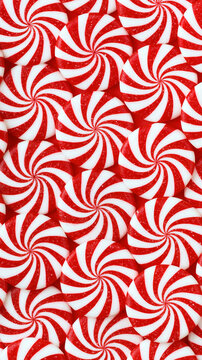 Vibrant red and white striped peppermint hard candies arranged in a festive repeating winter holiday illustration, seamless candy swirl pattern background, with copy space
