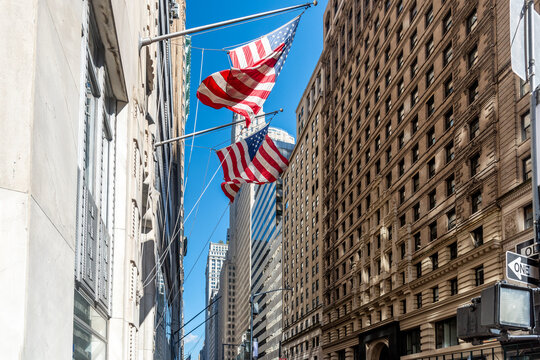American flag in Lower Manhattan beneath skyscrapers