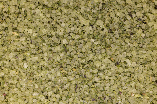 Green herbal seasoning salt blend macro close up
