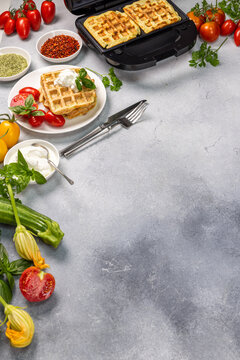 Healthy zucchini waffles making breakfast with fresh vegetables
