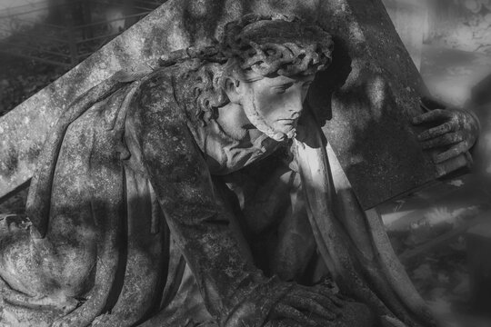 Jesus Christ falls under the weight of the cross on the way to Golgotha, a dramatic Christian scene symbolizing suffering, sacrifice, faith and redemption.