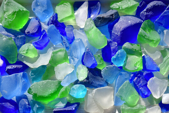 Full frame background of blue and green sea glass