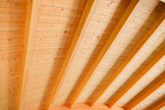 Wooden ceiling structure with detailed beams