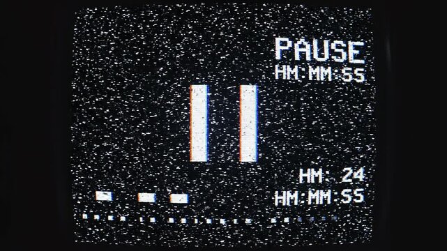 Retro VHS pause screen with static and digital noise representing video playback interruption