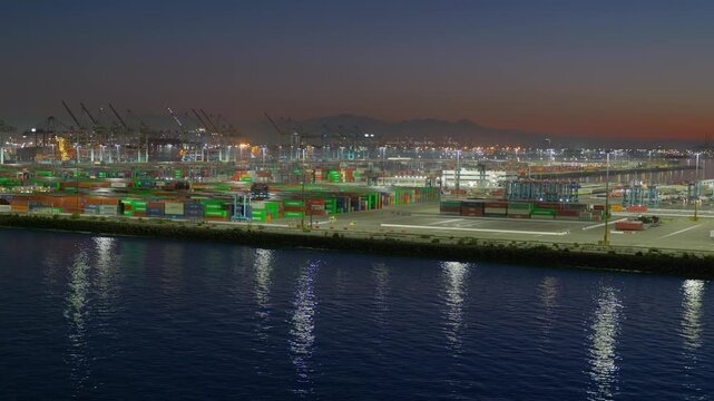 Los Angeles, California, USA - September 21, 2026: Panoramic view of the Port of Los Angeles cargo terminal at dusk