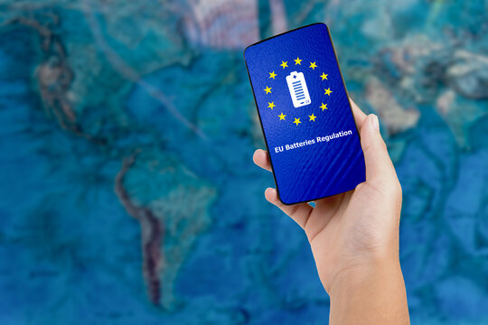 EU Battery Regulation text and icons on blurred world map background.