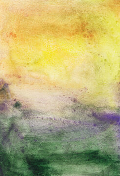 Watercolor background with soft shades of yellow and green and art stains on paper created by hand