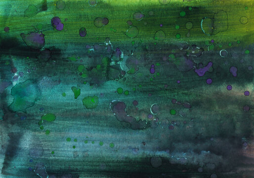 Deep green watercolor background with hand painted stains and textures on paper showcasing various shades