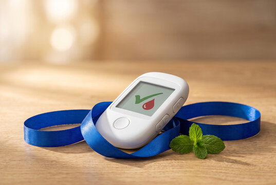 Blood glucose meter showing positive result on wooden surface