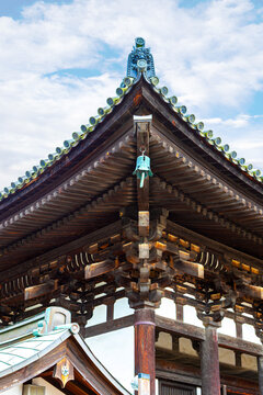 Japanese architecture known as kumimono or masugumi, a system of supporting blocks and brackets supporting the roof structure. The technique was introduced to Japan with Buddhism in the 6th century.