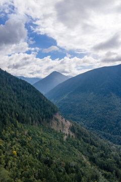 Lush Forested Mountains and Dramatic Cloud Sky Over a Valley Near Chilliwack, BC, Canada