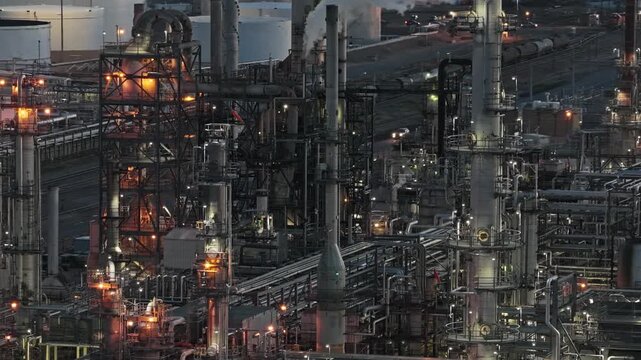 Oil refinery night america close up detailed shot drone video Denver Colorado 4K