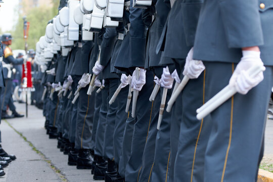 Santiago de Chile - September 19, 2026: view of a row of military personnel holding white batons in their gloved hands, Parada Militar 2026