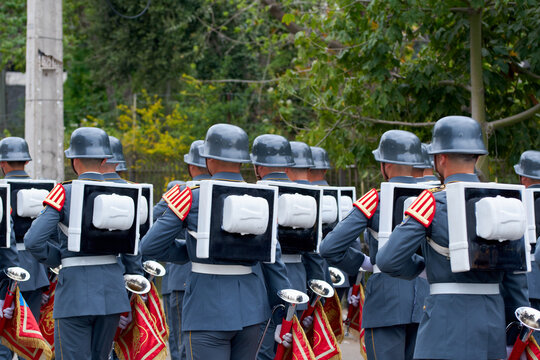 Santiago de Chile - September 19, 2026: Rear view of the brass section of a Chilean Army marching band on parade, Parada Militar 2026, Parque O'Higgins.  