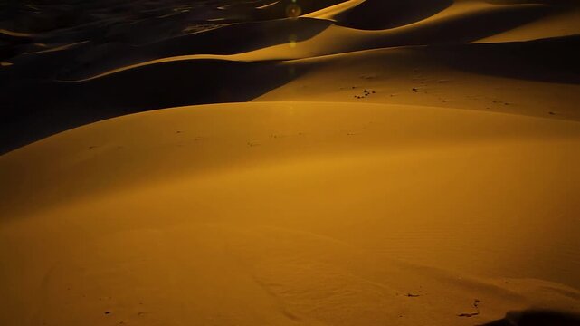 Sand dunes with sun, sunset, Khongor, Gobi Desert, Mongolia