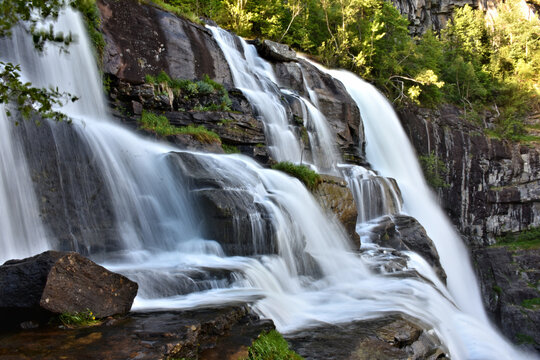Skjervsfossen Waterfall in Hordaland, Norway, Located on the road between Voss and Granvin - waterfall is a popular destination for hikers and travelers.