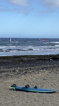 Windsurfing on Playa de Jaquita sandy beach near El Medano resort in Tenerife, Canary Islands,Spain.Travel, vacation concept,4K