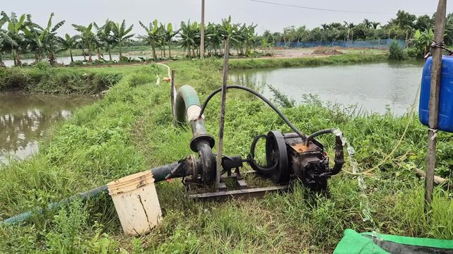 Diesel Engine Water Pump Transferring Water Between Fish Ponds Commercial Video