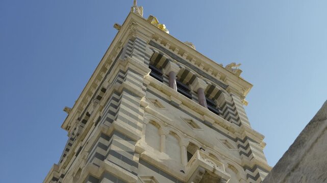 Low angle view of the bell tower of the Cathedrale La Major in Marseille, France