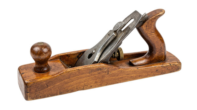 A vintage wooden hand plane rests ready for carpentry work as a skilled craftsman uses this traditional device to smooth surfaces of timber planks during the process of creating fine furniture