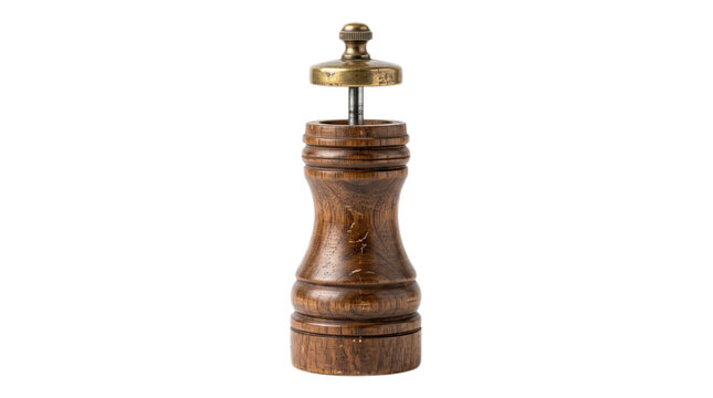 A traditional wooden pepper mill features a polished brass knob at the top for grinding savory aromatic spices which enhances the culinary experience during meal preparation in a busy home