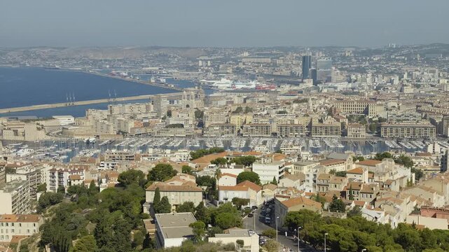 High angle view of Marseille city, the Old Port marina and the Mediterranean sea in France