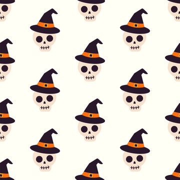 Cute Halloween seamless pattern featuring skulls wearing black witch hats on white background
