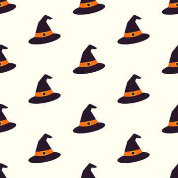 Seamless Halloween pattern featuring black witch hats with orange ribbons on white background