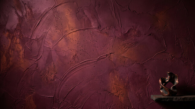 Textured rustic plaster wall with subtle magenta undertones for creative studio or product photography