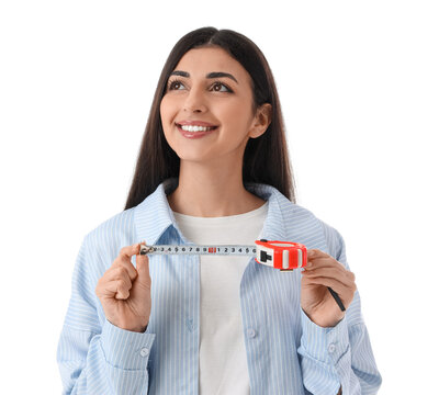 Beautiful young woman with measuring tape on white background