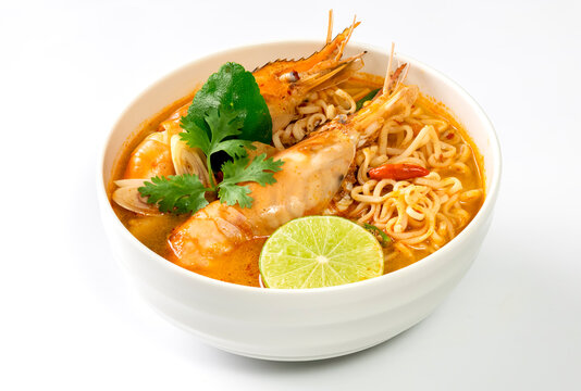 Instant noodles, Tom Yum Goong spicy shrimp soup in a white bowl isolate on white background.